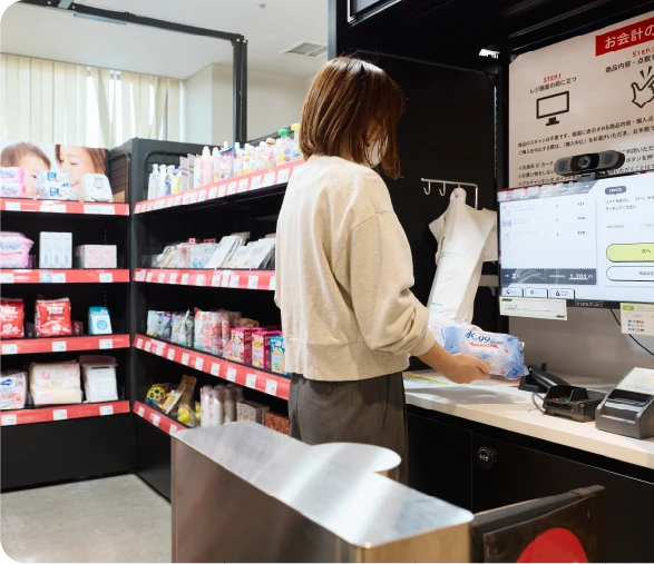 無人店舗での精算風景
